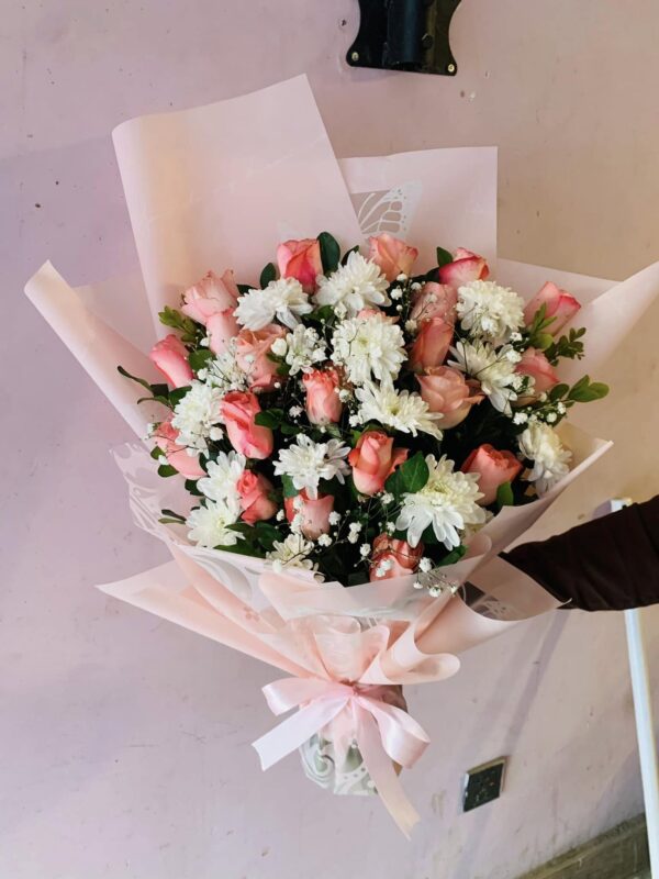 pink roses and baby breath bouquet