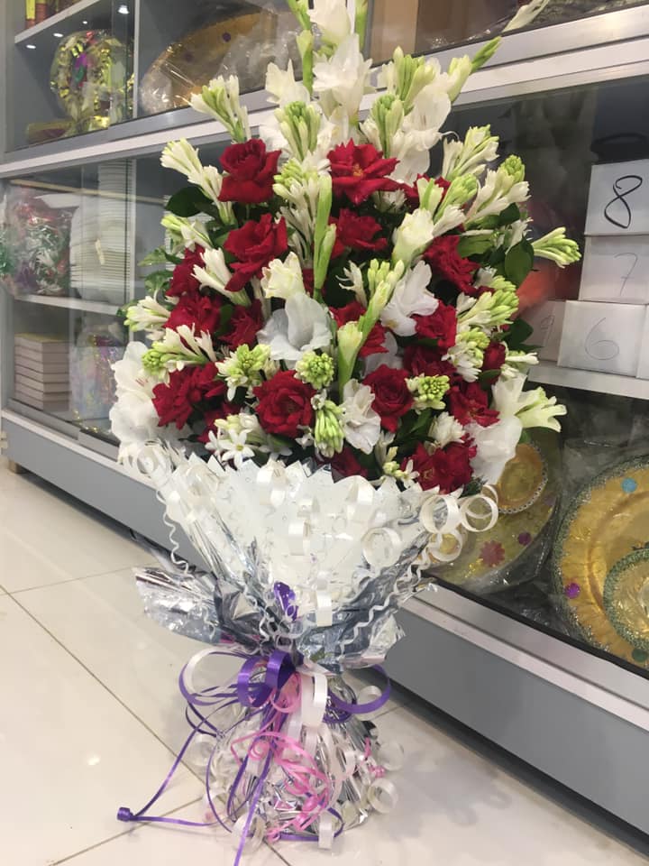 tube roses and red roses bouqet